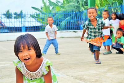 Filipino children play at Projects Abroad Care project Local Filipino children play at Projects Abroad Care placement in Philippines, Asia