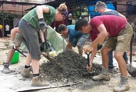 Nepal A group of volunteers working on a Building project in Nepal, constructing and repairing houses over their Christmas vacation.