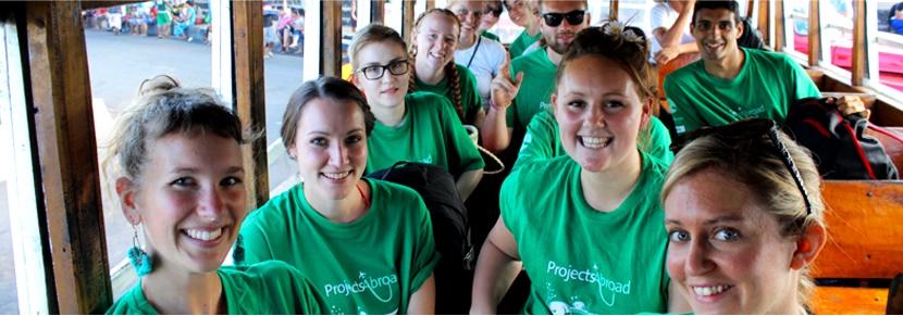 A group of Projects Abroad volunteers travel to their placement together. Projects Abroad volunteers travel on a group volunteer trip to a developing country.