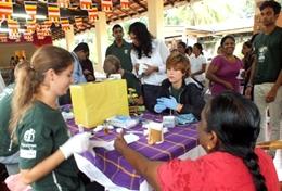 Medicine & Healthcare High School Project Medicine volunteers in Sri Lanka assist during a screening outreach.