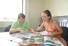 Journalism Two Journalism interns work together on compiling an article during their internship placement in Costa Rica.