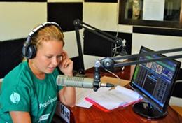Journalism A Journalism intern makes a recording for a local radio station during her internship in the Philippines.