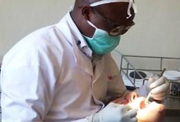 Medicine & Healthcare A professional dentist demonstrates a procedure to Dentistry volunteers doing their internship in Kenya.