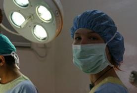Medicine & Healthcare A Dentistry intern prepares to observe dental surgery carried out by a medical professional in Nepal, Asia.