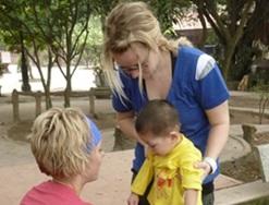 Medicine & Healthcare A medical volunteer works on strengthening a child's leg muscles at our Physiotherapy internship in Vietnam