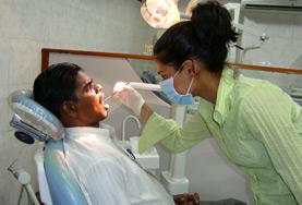 Dentistry A volunteer observes a dental check-up at one of our Dentistry internship placements.