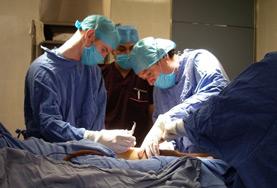 Medicine A medical intern observes a surgery carried out by local doctors at one of our volunteer placements abroad.