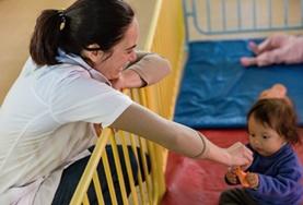 Social Work A volunteer spends time interacting with a young child as part of her Social Work internship in Bolivia.
