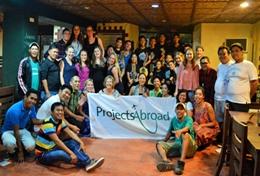 Sports School Sports volunteers and local Projects Abroad staff pose with a team of sports players in the Philippines.