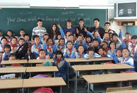 China A Teaching volunteer poses with her class from a local school in China.