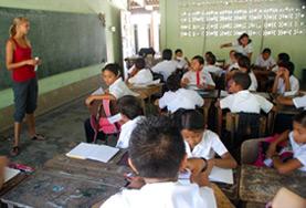Costa Rica A volunteer teaches an English lesson to a class of local students during her Teaching project work in Costa Rica.