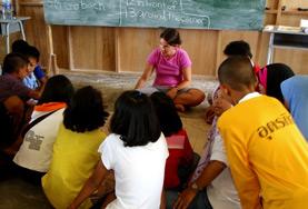 Thailand A Teaching volunteer runs a creative lesson with students at a local school in Thailand.